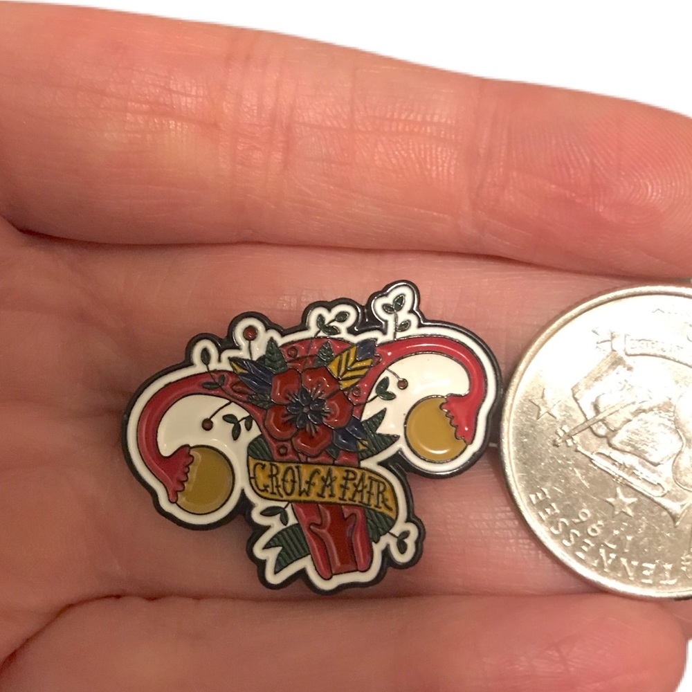 Feminist “grow a pair” enamel pin
